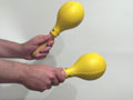 maracas handling like drumsticks (horizontal)